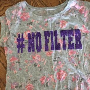 Has flowers and says “#no filter”